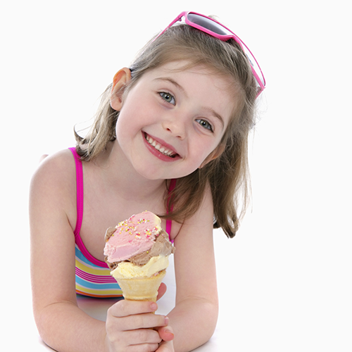 Litle girl holding an ice cream cone