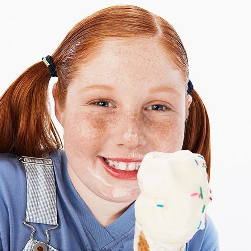 Red haired girl with an ice cream cone.